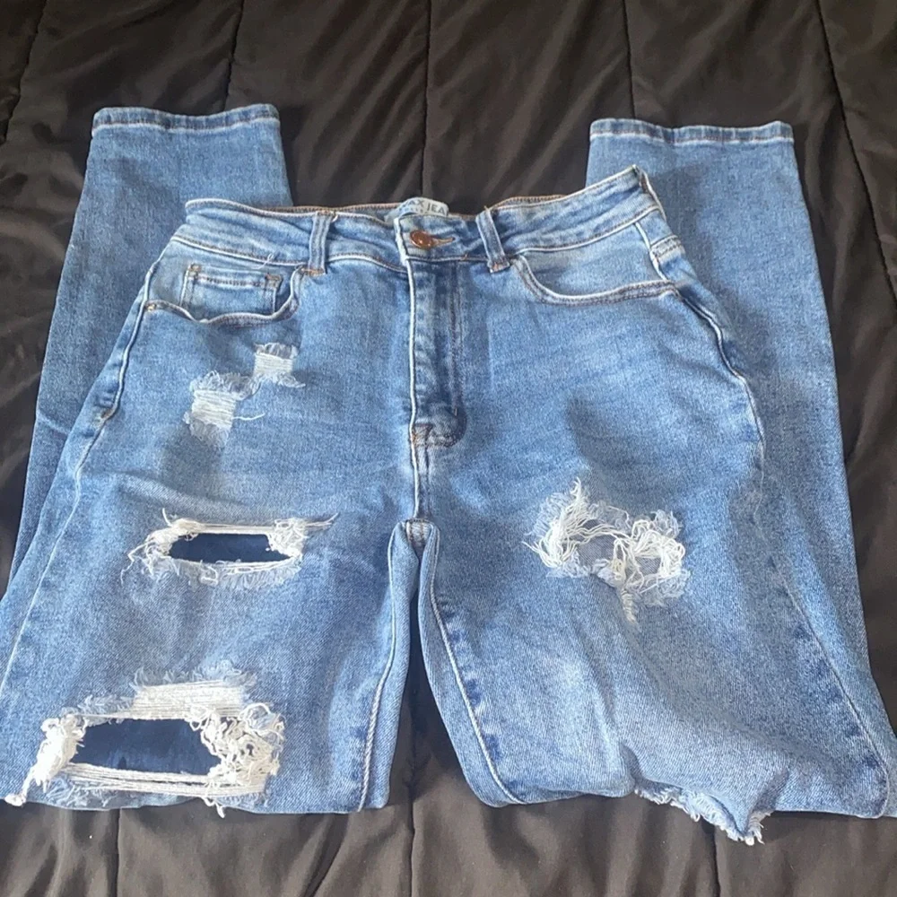 Distressed Blue Jeans